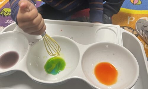 A child working with hands-on learning materials